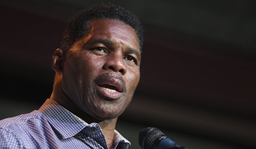 Herschel Walker, Republican candidate for U.S. Senate for Georgia, speaks at a primary watch party on May 23, 2022, at the Foundry restaurant in Athens, Ga. A woman who said Walker paid for her 2009 abortion is the mother of one of his children, according to a new report released Wednesday, Oct. 5, 2022, undercutting the Republican Senate candidate&#39;s claims that he did not know who she was. (AP Photo/Akili-Casundria Ramsess, File)