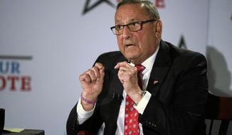 Republican Paul LePage participates in a gubernatorial debate, Tuesday, Oct. 4, 2022, at the Franco Center in Lewiston, Maine. LePage is challenging Democratic Gov. Janet Mils. (AP Photo/Robert F. Bukaty)