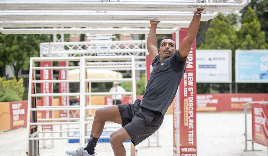 This photo provided by the Union Internationale de Pentathlon Moderne shows Yasser Hefny competing at a test event in Ankara, Turkey on June 28, 2022.  (Augustas Didzgalvis/UIPM via AP)  **FILE**