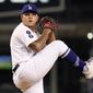 Los Angeles Dodgers starting pitcher Julio Urias throws to the plate during the first inning of a baseball game against the Colorado Rockies Tuesday, Oct. 4, 2022, in Los Angeles. (AP Photo/Mark J. Terrill)
