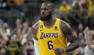 Los Angeles Lakers forward LeBron James (6) plays against the Phoenix Suns during a preseason NBA basketball game Wednesday, Oct. 5, 2022, in Las Vegas. (AP Photo/John Locher) **FILE**