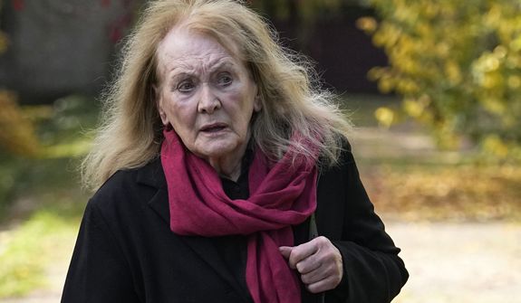 French author Annie Ernaux leaves her home in Cergy-Pontoise, outside Paris, Thursday, Oct. 6, 2022. 2022&#39;s Nobel Prize in literature has been awarded to French author Annie Ernaux. The 82-year-old was cited for &quot;the courage and clinical acuity with which she uncovers the roots, estrangements and collective restraints of personal memory,&quot; the Nobel committee said. (AP Photo/Michel Euler)