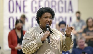 Georgia gubernatorial candidate Stacey Abrams answers questions from the crowd as she speaks during a visit to the Mack Gaston Community Center in Dalton, Ga., Friday, July 29, 2022. Abrams. a Democrat, announced on Friday, Oct. 7, that her campaign had raised more than $36 million in the third quarter. (Matt Hamilton/Chattanooga Times Free Press via AP, File)