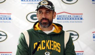 Green Bay Packers quarterback Aaron Rodgers holds a press conference at The Grove in Chandler&#x27;s Cross, England, Friday, Oct. 7, 2022 ahead the NFL game against New York Giants at the Tottenham Hotspur stadium on Sunday. (AP Photo/David Cliff)