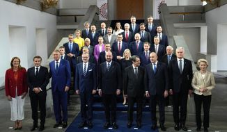 European Union leaders pose for a group photo during an EU Summit at Prague Castle in Prague, Czech Republic, Friday, Oct 7, 2022. European Union leaders converged on Prague Castle Friday to try to bridge significant differences over a natural gas price cap as winter approaches and Russia&#39;s war on Ukraine fuels a major energy crisis. Front row left, to right, European Parliament President Roberta Metsola, French President Emmanuel Macron, Romania&#39;s President Klaus Werner Ioannis, Czech Republic&#39;s Prime Minister Petr Fiala, European Council President Charles Michel, Cypriot President Nicos Anastasiades, Bulgaria&#39;s President Rumen Radev, Lithuania&#39;s President Gitanas Nauseda and European Commission President Ursula von der Leyen. (AP Photo/Petr David Josek)