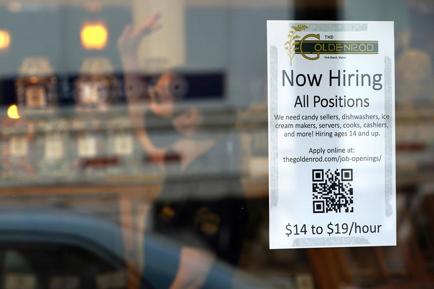 A sign advertises for help The Goldenrod, a popular restaurant and candy shop, Wednesday, June 1, 2022, in York Beach, Maine.  The number of available jobs in the U.S. plummeted in August 2022 compared with July as businesses grow less desperate for workers, a trend that could cool chronically high inflation. (AP Photo/Robert F. Bukaty, File)