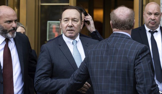 Actor Kevin Spacey leaves court following the day&#x27;s proceedings in a civil trial, Thursday, Oct 6, 2022, in New York, accusing him of sexually abusing a 14-year-old actor in the 1980s when he was 26. (AP Photo/Yuki Iwamura)