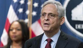 Attorney General Merrick Garland with Assistant Attorney General Kristen Clarke for the Civil Rights Division, speaks during a news conference at the Department of Justice in Washington, Thursday, Aug. 4, 2022. (AP Photo/Manuel Balce Ceneta) **FILE**