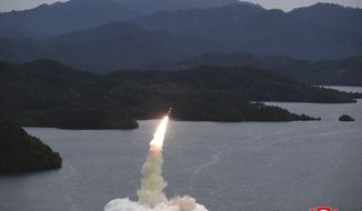 This photo provided on Oct. 10, 2022, by the North Korean government purports to show a missile test at an undisclosed location in North Korea, as taken sometime between Sept. 25 and Oct. 9. Independent journalists were not given access to cover the event depicted in this image distributed by the North Korean government. The content of this image is as provided and cannot be independently verified. Korean language watermark on image as provided by source reads: &quot;KCNA&quot; which is the abbreviation for Korean Central News Agency. (Korean Central News Agency/Korea News Service via AP)