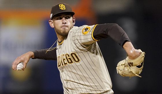 San Diego Padres starting pitcher Joe Musgrove (44) delivers against the New York Mets during the first inning of Game 3 of a National League wild-card baseball playoff series, Sunday, Oct. 9, 2022, in New York. (AP Photo/John Minchillo)