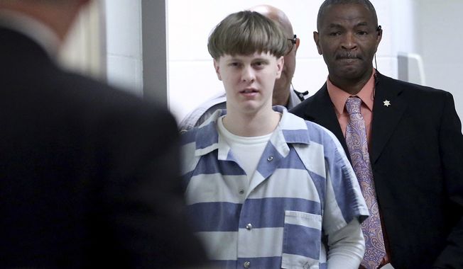 Dylann Roof enters the courtroom at the Charleston County Judicial Center to enter his guilty plea on murder charges on April 10, 2017, in Charleston, S.C. The Supreme Court has rejected an appeal from Roof, who challenged his death sentence and conviction in the 2015 racist slayings of nine members of a Black South Carolina congregation. (Grace Beahm/The Post And Courier via AP, Pool, File)