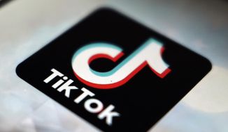The TikTok app logo is pictured in Tokyo, Sept. 28, 2020. TikTok is planning to operate its own warehouses in the U.S., a move that will deepen the social media company&#39;s foray into e-commerce. (AP Photo/Kiichiro Sato, File) **FILE**