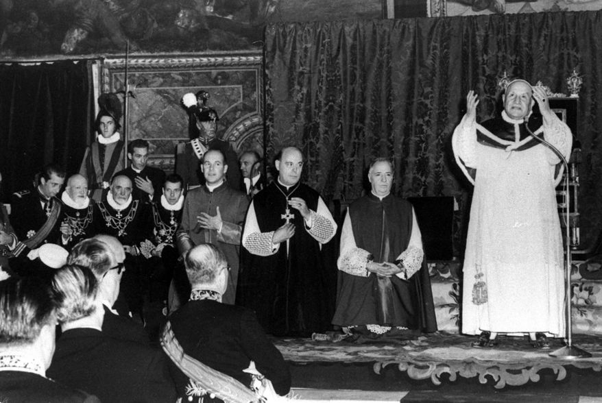 Pope John XXIII stands and prays in the Sistine Chapel in Vatican City, on Oct. 12, 1962, during a special audience for delegates from foreign governments to the ecumenical council. Pope Francis commemorates the 60th anniversary of the opening of the Second Vatican Council by celebrating a Mass in honor of St. John XXIII, the “good pope” who convened the landmark meetings that modernized the Catholic Church. (AP Photo/File)