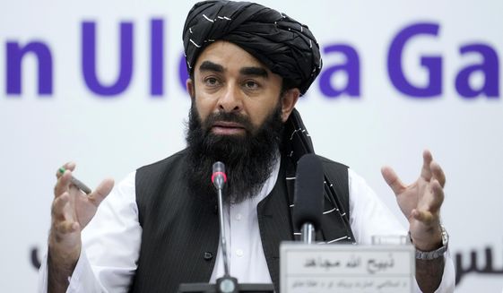 FILE - Zabiullah Mujahid, the spokesman for the Taliban government, speaks during a press conference in Kabul, Afghanistan, June 30, 2022. The Taliban said Wednesday, Oct. 12, 2022, that there is enough security across Afghanistan to restart major economic projects that stopped due to decades of war, despite a slew of attacks rocking the country since the group seized power a year ago. Mujahid said Wednesday that Afghanistan had the opportunity to connect with the rest of the countries in the region, highlighting China as a key part of the nation&#39;s economic development. (AP Photo/Ebrahim Noroozi, File)