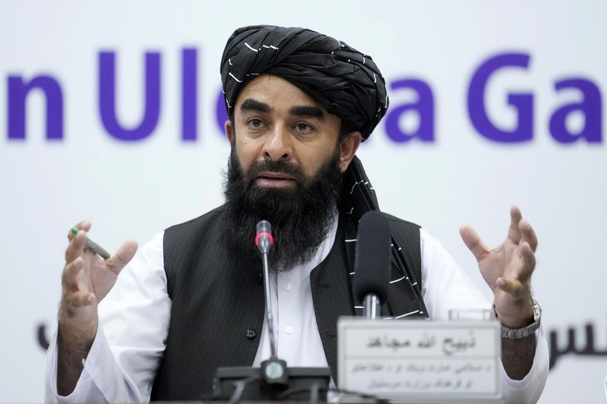 FILE - Zabiullah Mujahid, the spokesman for the Taliban government, speaks during a press conference in Kabul, Afghanistan, June 30, 2022. The Taliban said Wednesday, Oct. 12, 2022, that there is enough security across Afghanistan to restart major economic projects that stopped due to decades of war, despite a slew of attacks rocking the country since the group seized power a year ago. Mujahid said Wednesday that Afghanistan had the opportunity to connect with the rest of the countries in the region, highlighting China as a key part of the nation&#x27;s economic development. (AP Photo/Ebrahim Noroozi, File)