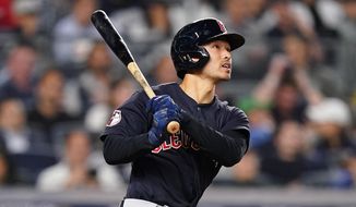 Cleveland Guardians Steven Kwan follows through on a solo home run against the New York Yankees during the third inning of Game 1 of an American League Division baseball series, Tuesday, Oct. 11, 2022, in New York. (AP Photo/Frank Franklin II) **FILE**