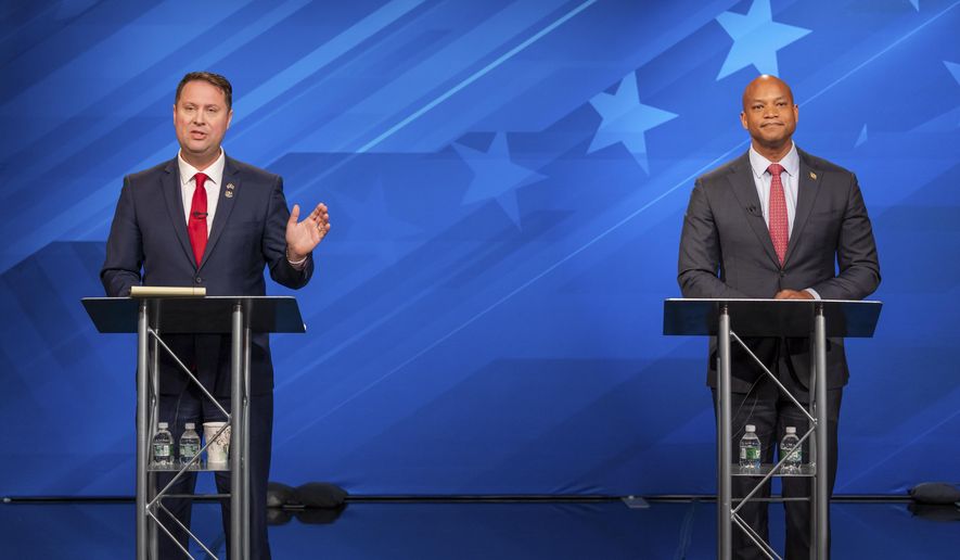 This image released by Maryland Public Television shows gubernatorial candidates Republican Dan Cox, left, and Democrat Wes Moore during a debate, Wednesday, Oct. 12, 2022, in Owings Mills, Md. (Maryland Public Television/Michael Ciesielski via AP, Pool)