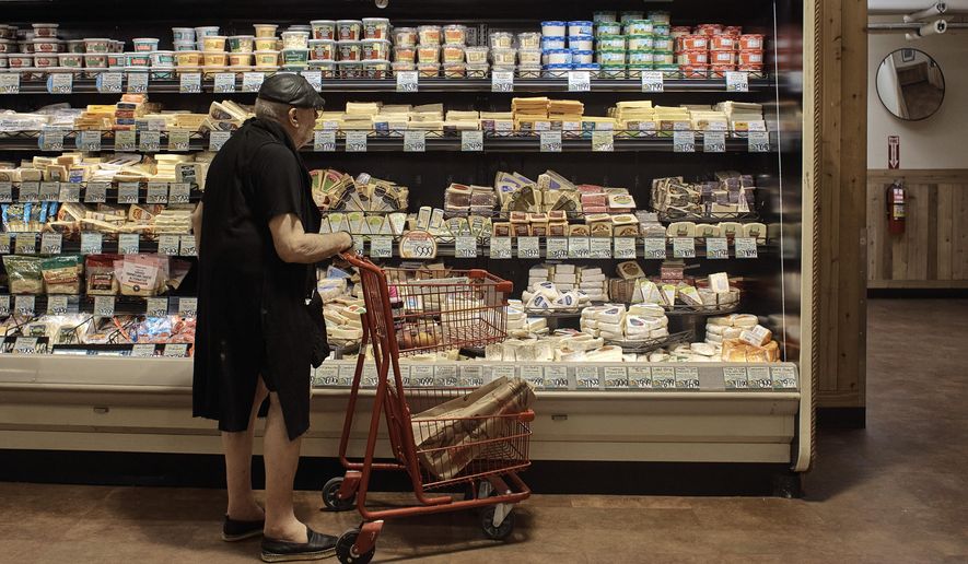 A man shops at a supermarket on Wednesday, July 27, 2022, in New York. On Thursday, Oct. 13, 2022, the U.S. government is set to announce what&#39;s virtually certain to be the largest increase in Social Security benefits in 40 years. The boost is meant to allow beneficiaries to keep up with inflation, and plenty of controversy surrounds the move. (AP Photo/Andres Kudacki, File)