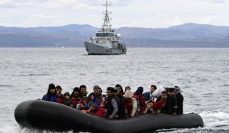 Migrants arrive with a dinghy accompanied by a Frontex vessel at the village of Skala Sikaminias, on the Greek island of Lesbos, after crossing the Aegean sea from Turkey, on Feb. 28, 2020. A much-anticipated report made public Thursday Oct. 13, 2022 by the European Union&#39;s anti-fraud watchdog into the alleged involvement of the EU border agency Frontex in the illegal pushbacks of migrants from Greece to Turkey has concluded that agency employees were involved in covering up such incidents in violation of peoples&#39; &amp;quot;fundamental rights.&amp;quot; (AP Photo/Michael Varaklas, File)