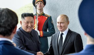 Russian President Vladimir Putin, center right, and North Korea&#39;s leader Kim Jong Un shake hands during their meeting in Vladivostok, Russia on April 25, 2019. As North Korea conducts more powerful weapons tests — and threatens pre-emptive nuclear strikes on Washington and Seoul — it may be taking inspiration from the fiery rhetoric of the leader of a nuclear-armed member of the U.N. Security Council: Russia&#39;s Vladimir Putin. (Yuri Kadobnov/Pool Photo via AP, File)
