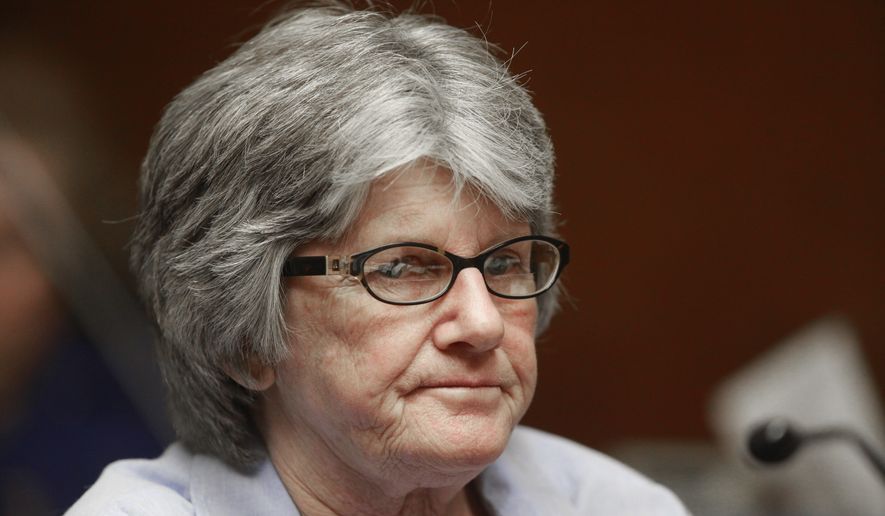 Former Manson family member and convicted murderer Patricia Krenwinkel listens to the ruling denying her parole, at a hearing at the California Institution for Women in Corona, Calif., Thursday, Jan. 20, 2011. California Gov. Gavin Newsom blocked Krenwinkel's parole, Friday Oct. 14, 2022, saying that she is still too much of a public safety risk. A two-member parole panel for the first time time, in May 2022, had recommended Krenwinkel's release. Krenwinkel, 74, was previously denied parole 14 times for the slayings of pregnant actress Sharon Tate and four other people in 1969. The next night, Krenwinkel helped kill grocer Leno LaBianca and his wife, Rosemary. (AP Photo/Reed Saxon, File)