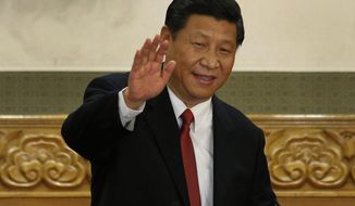 FILE - New Communist Party General Secretary Xi Jinping waves in Beijing&#x27;s Great Hall of the People on Nov. 15, 2012. When Xi Jinping came to power in 2012, it wasn&#x27;t clear what kind of leader he would be. His low-key persona during a steady rise through the ranks of the Communist Party gave no hint that he would evolve into one of modern China&#x27;s most dominant leaders, or that he would put the economically and militarily ascendant country on a collision course with the U.S.-led international order. (AP Photo/Vincent Yu, File)