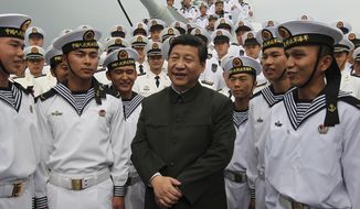 FILE - In this photo released by Xinhua News Agency, Xi Jinping, center, general secretary of the Communist Party of China talks to sailors onboard the Haikou navy destroyer during his inspection of the Guangzhou military theater of operations of the People&#39;s Liberation Army (PLA) in Guangzhou, China on Dec. 8, 2012. When Xi Jinping came to power in 2012, it wasn&#39;t clear what kind of leader he would be. His low-key persona during a steady rise through the ranks of the Communist Party gave no hint that he would evolve into one of modern China&#39;s most dominant leaders, or that he would put the economically and militarily ascendant country on a collision course with the U.S.-led international order. (Wang Jianmin/Xinhua via AP, File)