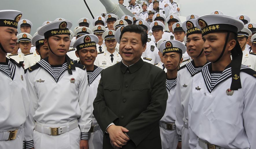 FILE - In this photo released by Xinhua News Agency, Xi Jinping, center, general secretary of the Communist Party of China talks to sailors onboard the Haikou navy destroyer during his inspection of the Guangzhou military theater of operations of the People&#x27;s Liberation Army (PLA) in Guangzhou, China on Dec. 8, 2012. When Xi Jinping came to power in 2012, it wasn&#x27;t clear what kind of leader he would be. His low-key persona during a steady rise through the ranks of the Communist Party gave no hint that he would evolve into one of modern China&#x27;s most dominant leaders, or that he would put the economically and militarily ascendant country on a collision course with the U.S.-led international order. (Wang Jianmin/Xinhua via AP, File)