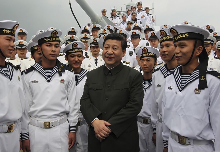 FILE - In this photo released by Xinhua News Agency, Xi Jinping, center, general secretary of the Communist Party of China talks to sailors onboard the Haikou navy destroyer during his inspection of the Guangzhou military theater of operations of the People&#x27;s Liberation Army (PLA) in Guangzhou, China on Dec. 8, 2012. When Xi Jinping came to power in 2012, it wasn&#x27;t clear what kind of leader he would be. His low-key persona during a steady rise through the ranks of the Communist Party gave no hint that he would evolve into one of modern China&#x27;s most dominant leaders, or that he would put the economically and militarily ascendant country on a collision course with the U.S.-led international order. (Wang Jianmin/Xinhua via AP, File)
