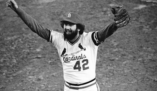 St. Louis Cardinals ace reliever Bruce Sutter celebrates after the last out in the ninth inning of Game 7 of the World Series at St. Louis, Oct. 20, 1982. Hall of Fame reliever and 1979 Cy Young winner Bruce Sutter has died. He was 69. Major League Baseball and the St. Louis Cardinals announced Sutter’s death on Friday, Oct. 14, 2022. The Baseball Hall of Fame says Sutter died Thursday in Cartersville, Georgia.  (AP Photo/File)