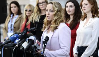 Actress Louisette Geiss speaks at a news conference by the &amp;quot;Silence Breakers,&amp;quot; a group of women who have spoken out about Hollywood producer Harvey Weinstein&#39;s sexual misconduct, at Los Angeles City Hall, on Feb. 25, 2020, in Los Angeles. Geiss, a former actress and screenwriter who accused Weinstein in 2017, has written a musical stemming from her experiences with Weinstein. “The Right Girl,” which was waylaid by the pandemic but will be produced live onstage sometime in 2023. (AP Photo/Chris Pizzello, File)