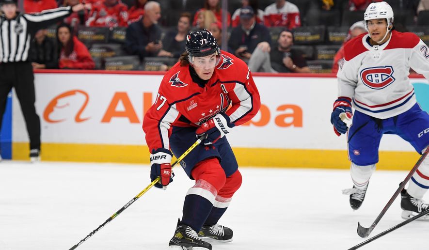Washington Capitals right wing T.J. Oshie (77) about to shoot the puck during the 3rd period in a game against the Montreal Canadiens at Capital One Arena in Washington D.C., October 15, 2022. (Photo by All-Pro Reels)