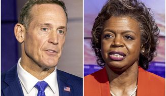 This combination of photos shows North Carolina Republican Senate candidate Rep. Ted Budd, R-N.C., left, and Democratic candidate Cheri Beasley, right, during a televised debate on Oct. 7, 2022, at Spectrum News 1 studio in Raleigh, N.C. (Travis Long/The News &amp; Observer via AP, Pool)