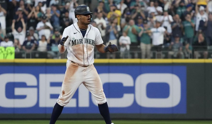 Seattle Mariners&#x27;s Julio Rodriguez reacts after stealing second base during the 13th inning in Game 3 of an American League Division Series baseball game against the Houston Astros, Saturday, Oct. 15, 2022, in Seattle. (AP Photo/Ted S. Warren) **FILE**