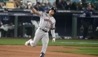 Houston Astros&#39; Jeremy Pena (3) celebrates as he rounds the bases after hitting a home run against the Seattle Mariners during the 18th inning in Game 3 of an American League Division Series baseball game Saturday, Oct. 15, 2022, in Seattle. (AP Photo/Stephen Brashear)
