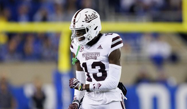 Mississippi State cornerback Emmanuel Forbes celebrates after a fumble by Kentucky during the first half of an NCAA college football game in Lexington, Ky., Saturday, Oct. 15, 2022. (AP Photo/Michael Clubb) ** FILE **