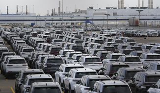 New vehicles are shown parked in storage lots near the the Stellantis Detroit Assembly Complex in Detroit, Wednesday, Oct. 5, 2022. Over the past few years, thieves have driven new vehicles from automaker storage lots and dealerships across the Detroit area. In 2018, eight vehicles were driven from what then was Fiat Chrysler&#39;s Jefferson North plant. (AP Photo/Paul Sancya)