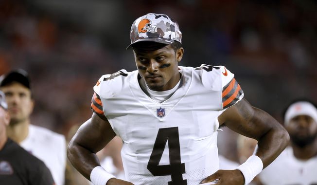 Cleveland Browns quarterback Deshaun Watson walks off of the field during an NFL preseason football game against the Chicago Bears, Saturday Aug. 27, 2022, in Cleveland. NFL Commissioner Roger Goodell said suspended quarterback Watson has met the requirements of his settlement with the league to this point after being accused of sexual misconduct by two dozen women. (AP Photo/Kirk Irwin, File) **FILE**