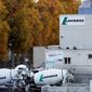A site of cement maker Lafarge is pictured in Paris, Nov. 14, 2017. Lafarge has pleaded guilty to paying $17 million to the Islamic State group so that a plant in Syria could remain open, in a case the Justice Department describes as the first of its kind. The charges were announced Tuesday in federal court in New York City. The allegations involve conduct that was earlier investigated by authorities in France. (AP Photo/Christophe Ena)