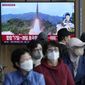 A TV screen shows a file image of North Korea&#39;s missile launch during a news program at the Seoul Railway Station in Seoul, South Korea, on Oct. 14, 2022. South Korea says North Korea has fired about 100 shells off its west coast and 150 rounds off its east coast in its latest weapons test Tuesday night, Oct. 18. (AP Photo/Ahn Young-joon, File)