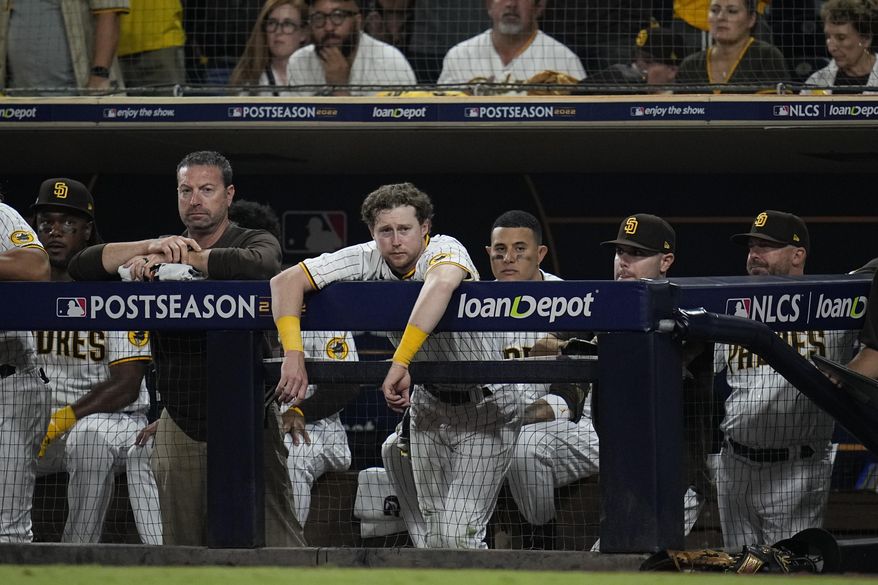 San Diego Padres watch in their loss to the Philadelphia Phillies during Game 1 of the baseball NL Championship Series between the San Diego Padres and the Philadelphia Phillies on Tuesday, Oct. 18, 2022, in San Diego. (AP Photo/Gregory Bull)