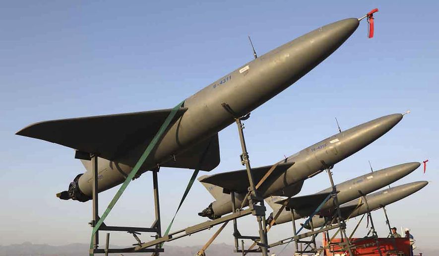 In this photo released by Iranian Army on  Aug. 24, 2022, drones are prepared for launch during a military drone drill in Iran. The Iranian-made drones that Russia sent slamming into central Kyiv this week have produced hand-wringing and consternation in Israel, complicating the country’s balancing act between Russia and the West. (Iranian Army via AP)