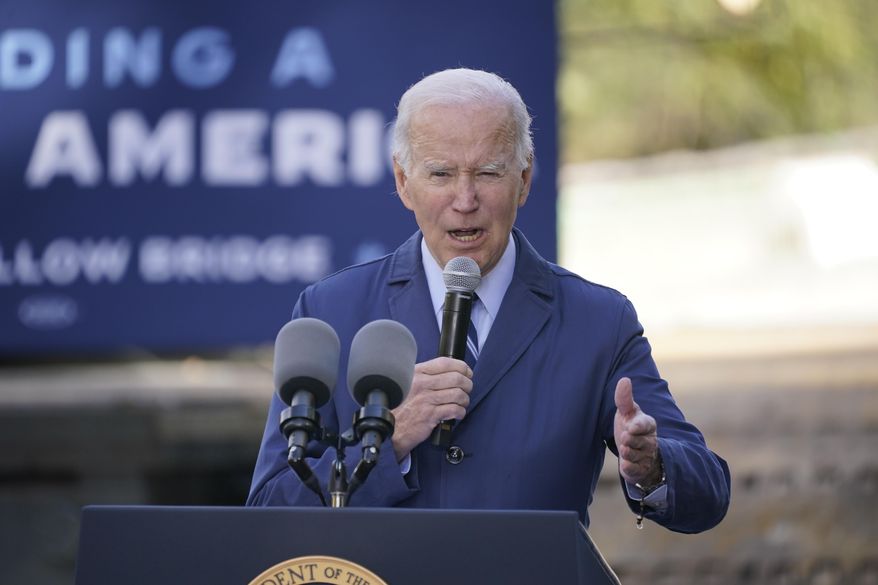 President Joe Biden speaks about his infrastructure agenda while visiting the under construction Fern Hollow Bridge, in Pittsburgh, Thursday, Oct. 20, 2022. (AP Photo/Gene J. Puskar)