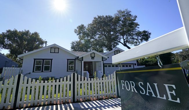 A home for sale is seen on Dec. 8, 2020, in Orlando, Fla. Sales of previously occupied U.S. homes fell in September 2022 for the eighth month in a row, matching the pre-pandemic sales pace from 10 years ago, as house hunters faced sharply higher mortgage rates, higher home prices and a still tight supply of properties on the market. (AP Photo/John Raoux, File)