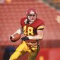 In a photo provided by USC Athletics, former Southern California player Matthew Gee plays in an NCAA college football game. A lawsuit alleging that the NCAA failed to protect a former Gee from repeated concussions is nearing trial in a Los Angeles court, with a jury seated Thursday, Oct. 20, 2022, in what could become a landmark case. The suit filed by Gee&#39;s widow says the former USC linebacker died in 2018 from permanent brain damage caused by countless blows to the head he took while playing for the 1990 Rose Bowl-winning team. (USC Athletics via AP)