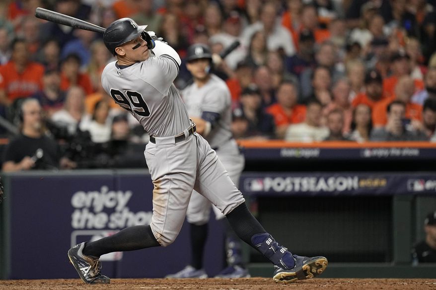 New York Yankees center fielder Aaron Judge (99) flys out during the eighth inning in Game 2 of baseball&#x27;s American League Championship Series between the Houston Astros and the New York Yankees, Thursday, Oct. 20, 2022, in Houston. (AP Photo/Eric Gay) **FILE**