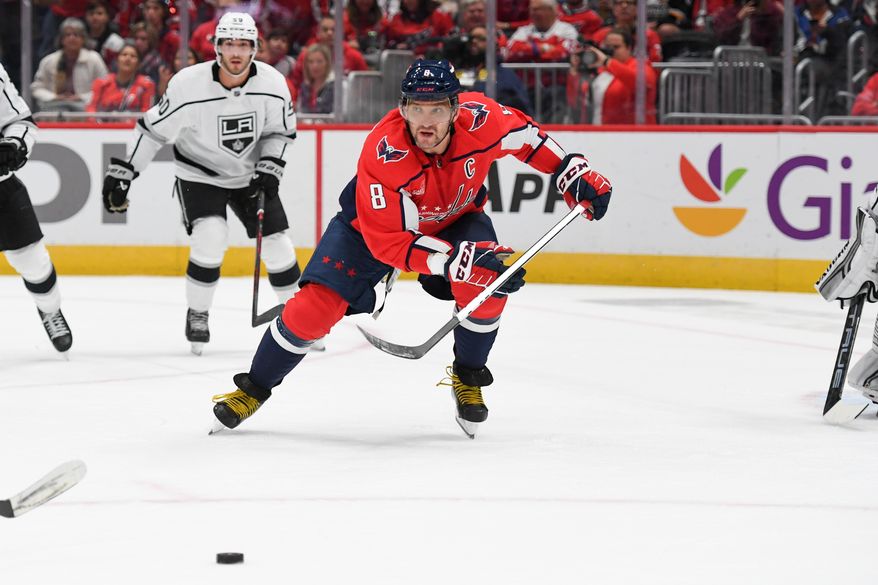 Washington Capitals left wing Alex Ovechkin (8) skating towards the puck during the 1st period in a game against the Los Angeles Kings at Capital One Arena in Washington D.C., October 22, 2022. (Photo by Billy Sabatini)