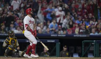 Philadelphia Phillies&#x27; Kyle Schwarber watches his home run during the sixth inning in Game 4 of the baseball NL Championship Series between the San Diego Padres and the Philadelphia Phillies on Saturday, Oct. 22, 2022, in Philadelphia. (AP Photo/Matt Rourke) **FILE**
