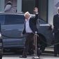 Former Prime Minister Boris Johnson arrives at Gatwick Airport in London, after travelling on a flight from the Caribbean, following the resignation of Liz Truss as Prime Minister, Saturday Oct. 22, 2022. (Gareth Fuller/PA via AP)