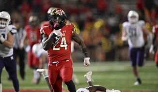 Maryland running back Roman Hemby runs for a touchdown against Northwestern in the second half of an NCAA college football game, Saturday, Oct. 22, 2022, in College Park, Md. Maryland won 31-24. (AP Photo/Gail Burton)